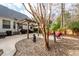 Landscaped backyard with pergola, patio, and seating area at 122 North Park Ave, Summerville, SC 29485