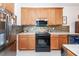 Modern kitchen with black appliances and a stylish backsplash at 122 North Park Ave, Summerville, SC 29485