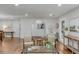 Living room with hardwood floors, neutral decor, and a cozy seating arrangement at 1318 Manor Blvd, Charleston, SC 29407