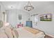 Main bedroom with a large bed, barn door, and en-suite bath at 147 Mcmakin Dr, Summerville, SC 29483