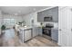 Modern kitchen with gray cabinets, stainless steel appliances, and granite countertops at 204 Cache Ct, Charleston, SC 29414