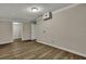 Large bedroom with hardwood floors, neutral walls, and ample space at 2265 Bailey Dr, North Charleston, SC 29405