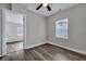 Charming bedroom with hardwood floors and a window with blinds at 2265 Bailey Dr, North Charleston, SC 29405