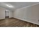 Spacious living area with hardwood floors and an exterior door at 2265 Bailey Dr, North Charleston, SC 29405
