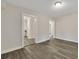 Spacious living room with light walls and wood-look flooring at 2265 Bailey Dr, North Charleston, SC 29405