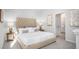 Spacious bedroom with a plush bed, nightstands, and plenty of natural light at 304 Tiliwa Street, Summerville, SC 29486
