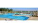 Large community pool with plenty of lounge chairs at 304 Tiliwa Street, Summerville, SC 29486