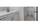 Clean bathroom with white vanity,tiled floor, and bathtub at 318 Abercom Place Dr, Moncks Corner, SC 29461