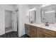 Modern bathroom with double vanity, hexagon floor tile, and walk-in shower at 318 Abercom Place Dr, Moncks Corner, SC 29461