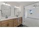 Bathroom with double vanity, hexagon tile floor, and bedroom access at 318 Abercom Place Dr, Moncks Corner, SC 29461