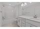 Main bathroom with tub, shower, double vanity, and white cabinets at 318 Abercom Place Dr, Moncks Corner, SC 29461