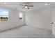 Spacious bedroom with plush carpeting and ceiling fan at 318 Abercom Place Dr, Moncks Corner, SC 29461