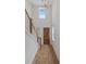 Bright foyer with hardwood floors and a view to the kitchen at 318 Abercom Place Dr, Moncks Corner, SC 29461