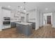 Modern kitchen with white and gray cabinets and a large island at 318 Abercom Place Dr, Moncks Corner, SC 29461