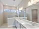 Spa-like bathroom with double vanity, large shower, and modern fixtures at 364 Trailmore Ln, Summerville, SC 29486