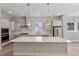 Spacious kitchen with light gray cabinets and a large island at 364 Trailmore Ln, Summerville, SC 29486