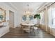 Modern dining room featuring a round table, four chairs, and a stylish light fixture at 437 Parish Farms Dr, Summerville, SC 29486