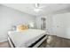 Bedroom with king-size bed, gray walls, and access to bathroom at 4857 Oak Leaf Rd, Summerville, SC 29485