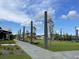 Landscaped park with walking paths and benches at 719 Rumbling Leaf Ln, Summerville, SC 29486