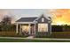 Gray craftsman style home with white trim and front porch at 719 Rumbling Leaf Ln, Summerville, SC 29486
