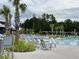 Community pool with plenty of lounge chairs at 719 Rumbling Leaf Ln, Summerville, SC 29486