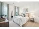 Cozy bedroom with neutral bedding and ample natural light at 742 Blueway Ave, Summerville, SC 29486