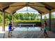 Covered outdoor area with ping pong and games at 742 Blueway Ave, Summerville, SC 29486