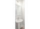 Simple, clean powder room with pedestal sink and mirror at 744 Blueway Ave, Summerville, SC 29486
