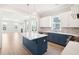 Open concept kitchen with island and stainless steel appliances at 744 Blueway Ave, Summerville, SC 29486