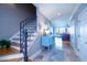 Bright entryway with tile flooring, a stylish console table, and elegant staircase at 75 Lost Village Trl, Edisto Island, SC 29438