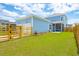 Charming home with fenced backyard, two-car garage, and large lawn at 825 Gentle Breeze Dr, Summerville, SC 29486
