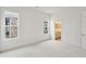 Spacious bedroom with carpet, neutral walls, and a view of the bathroom at 825 Gentle Breeze Dr, Summerville, SC 29486