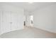 Spacious bedroom with plush carpeting and ample closet space at 825 Gentle Breeze Dr, Summerville, SC 29486
