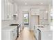 Open concept kitchen with an island and stainless steel appliances at 825 Gentle Breeze Dr, Summerville, SC 29486