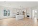 Open concept kitchen with island and stainless steel appliances at 825 Gentle Breeze Dr, Summerville, SC 29486