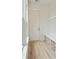 Mudroom with built-in bench and storage, and wood-look flooring at 825 Gentle Breeze Dr, Summerville, SC 29486