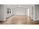 Bright bedroom with hardwood floors and vaulted ceiling at 929 Long Point Rd, Mount Pleasant, SC 29464