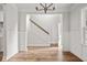 Bright entryway with hardwood floors and staircase at 929 Long Point Rd, Mount Pleasant, SC 29464