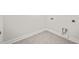 Convenient laundry room with gray tile floor at 929 Long Point Rd, Mount Pleasant, SC 29464