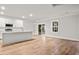 Spacious living room with hardwood floors and ceiling fan at 929 Long Point Rd, Mount Pleasant, SC 29464