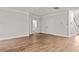 Living room with hardwood floors and half bathroom at 929 Long Point Rd, Mount Pleasant, SC 29464