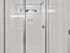 Walk-in shower with white subway tile and glass enclosure at 929 Long Point Rd, Mount Pleasant, SC 29464
