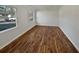 Spacious bedroom featuring hardwood floors and large windows at 100 Heber Rd, Summerville, SC 29485