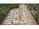 Aerial view of new homes under construction near a pond at 109 River Hill Rd, Goose Creek, SC 29445