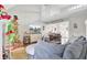 Cozy living room with Christmas tree, fireplace, and gray sectional at 116 Traders Station Rd, Summerville, SC 29486