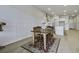 Bright dining area with hardwood floors, and a rustic wooden table at 1307 Black Skimmer St, Summerville, SC 29485