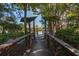 Private lake access with wooden walkway and pergola at 1307 Black Skimmer St, Summerville, SC 29485