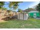 Spacious backyard with storage shed and surfboard racks at 1328 Cottonwood St, Charleston, SC 29403
