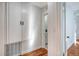 Bright hallway with white cabinets and a view of the bathroom at 1328 Cottonwood St, Charleston, SC 29403
