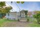 Back of house with charming porch and string lights at 1328 Cottonwood St, Charleston, SC 29403